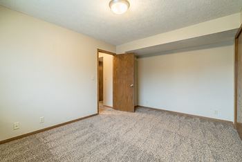 Interiors-fountain glen apartment bedroom with lots of natural light in lincoln nebraska